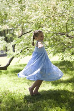 Your preschooler spins around in a circle until she can't stand up.