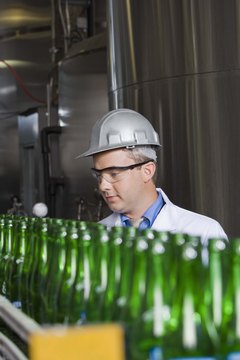 Man working an assembly line in a brewery