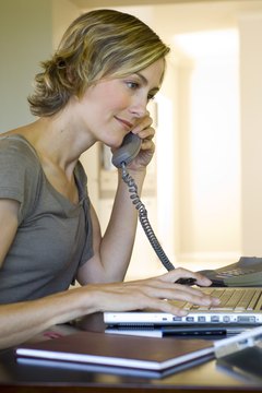 Jupiterimages/Pixland/Getty Images Extend the professional courtesy of a personal phone call to cancel an interview.