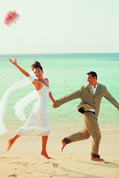 Stockbyte/Stockbyte/Getty Images You can marry a spouse with debt: You won't be responsible for it.