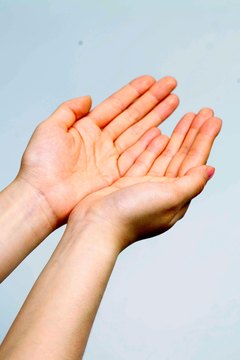 Jupiterimages/Photos.com/Getty Images Keeping your hands intact for climbing means prevention and treatment of blisters.