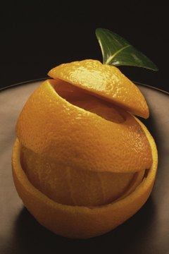 Jupiterimages/Comstock/Getty Images Orange peel contains D-limonene.