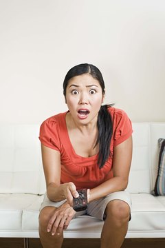 Jupiterimages/Brand X Pictures/Getty Images High estrogen can cause mood swings and water retention.