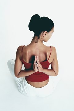 Polka Dot Images/Polka Dot/Getty Images The serratus anterior muscles hold your shoulder blades in place.