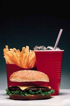 Comstock/Comstock/Getty Images Just because it's served to you doesn't mean you have to clean your plate.