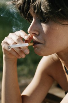 David De Lossy/Photodisc/Getty Images You'll need to have been smoke-free for 12 months to qualify as a nonsmoker.