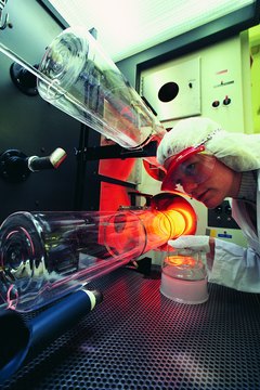 Photodisc/Photodisc/Getty Images Manufacturers of computer chips and other high-tech products hire physicists as engineering managers.