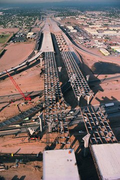 Stockbyte/Stockbyte/Getty Images Municipalities issue bonds to raise funds for road construction projects.
