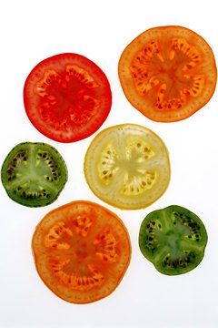 Jupiterimages/Comstock/Getty Images Tomatoes contain blood pressure-lowering substances.