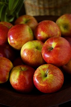 Thinkstock Images/Comstock/Getty Images Conventionally grown apples have high levels of pesticide residue.