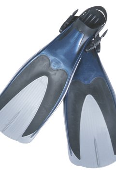 Hemera Technologies/PhotoObjects.net/Getty Images Swim fins can make your legs and heart stronger.