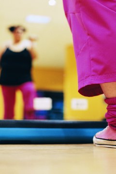 Digital Vision./Digital Vision/Getty Images Stepping is a good way to tone saddlebags.