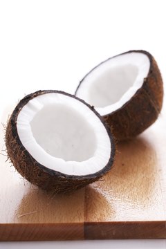 Martin Poole/Digital Vision/Getty Images Virgin coconut oil is made from fresh coconut milk.