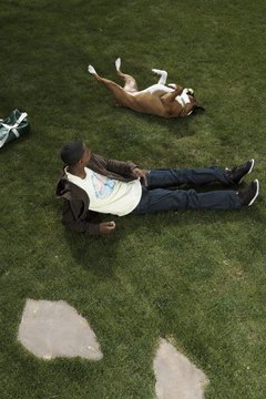 Thomas Northcut/Digital Vision/Getty Images Make your own herbicides to reduce your family's exposure to toxic lawn chemicals.