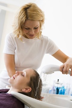 BananaStock/BananaStock/Getty Images Cosmetologists spend a lot of time on their feet treating clients.