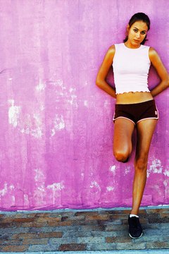 Stockbyte/Stockbyte/Getty Images Plyometric exercises shape and tone your leg muscles while blasting fat.