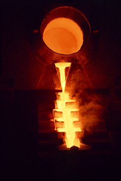 Jupiterimages/liquidlibrary/Getty Images Invest in gold by investing in businesses that mine and refine it.