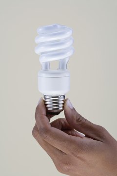 Thinkstock Images/Comstock/Getty Images Compact fluorescent bulbs can save up to 75 percent of your lighting energy use.