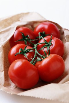 Digital Vision/Digital Vision/Getty Images Tomatoes can help you avoid unwanted weight gain.