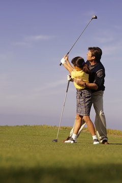 A professional instructor can teach you how to bring the club back by turning your shoulders.