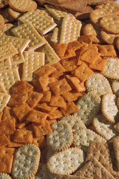 Comstock/Comstock/Getty Images Saltine crackers don't provide many essential nutrients.