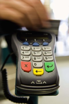Jupiterimages/Polka Dot/Getty Images You pay much more on credit card transactions than just the purchase price.