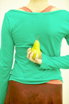 Jupiterimages/Photos.com/Getty Images Use a back scratcher stretch to increase shoulder range of motion.