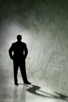 Silhouette of man with money