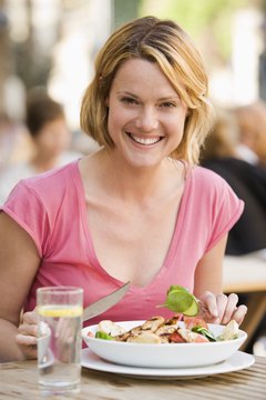 BananaStock/BananaStock/Getty Images Chicken is rich in the amino acid tryptophan.