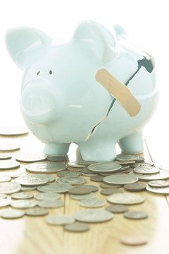 Hemera Technologies/AbleStock.com/Getty Images Car loans help rehabilitate credit ratings that tank during bankruptcy.