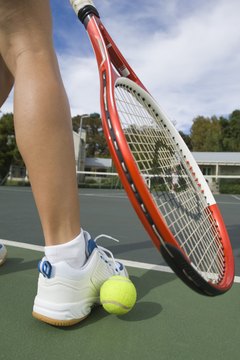 Jupiterimages/Pixland/Getty Images Warming up sore calf muscles helps your movement.