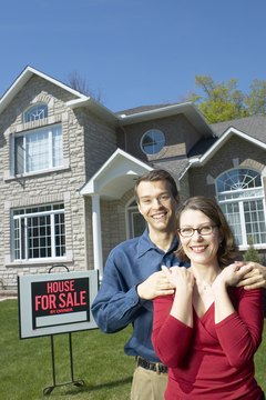Hemera Technologies/AbleStock.com/Getty Images Use suggested housing cost guidelines as starting points for budgeting your finances.