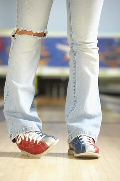 Jupiterimages/Photos.com/Getty Images Rolling ankles can lead to sprains, back pain and sore joints.
