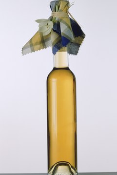 John Foxx/Stockbyte/Getty Images Fatty acids in olive oil produce DHA and EPA in your body.