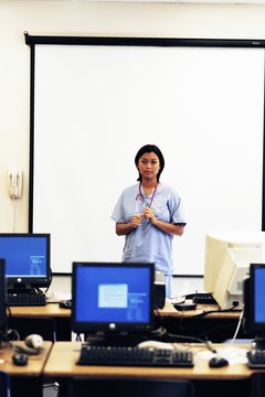 Ablestock.com/AbleStock.com/Getty Images Nurse educators often teach evening classes to accommodate students' training schedules.