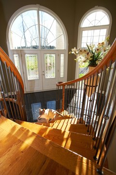 Jupiterimages/Photos.com/Getty Images Setting boundaries can keep your cat off the stairs.