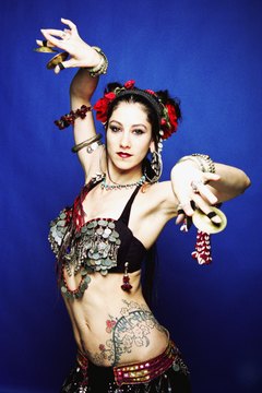 Brand X Pictures/Brand X Pictures/Getty Images Tone that exposed tummy for impressive moves in belly dancing.