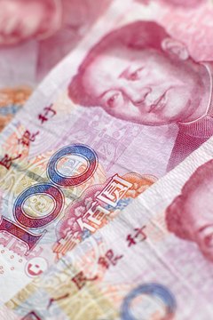 BananaStock/BananaStock/Getty Images China tightly controls the value of its money, but investors can still speculate on the yuan.
