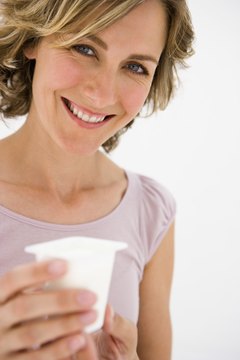 Jupiterimages/Pixland/Getty Images Yogurt may protect against some forms of cancer.