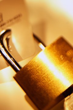 Stockbyte/Stockbyte/Getty Images A secured credit card locks in your funds for a specified period of time.
