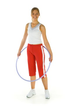 Jupiterimages/Photos.com/Getty Images You can Hula Hoop your way to a better body.