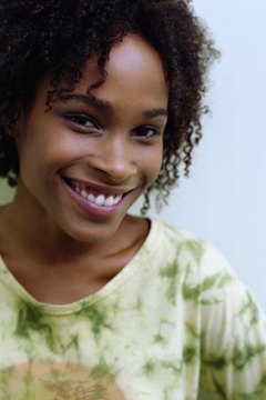 Creatas Images/Creatas/Getty Images Gravity, not facial expressions, is the primary cause of sagging cheeks and jowls.