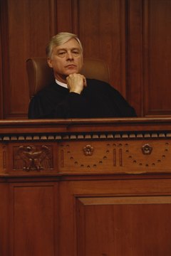Jupiterimages/Photos.com/Getty Images Probate judges appoint executors to prepare estate inventories.
