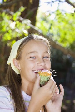 Jupiterimages/Goodshoot/Getty Images Sweeten cakes with berries and dried fruit instead of sugar.