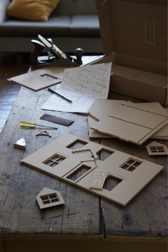 Cardboard can be used to build a fake house.
