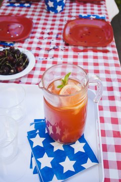 Pitcher of iced beverage on picnic table