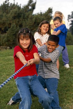 Brand X Pictures/Brand X Pictures/Getty Images A simple game, such as tug-o-war, can build a youth's arm muscles.