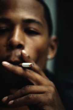 Ryan McVay/Photodisc/Getty Images Smoking may cost you a job.