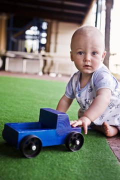 Even a simple act like pushing a toy truck across a carpet involves friction as well as kinetic energy.