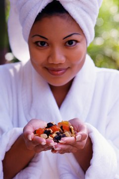 Thinkstock Images/Comstock/Getty Images Peanuts and dried fruit provide protein, fiber and antioxidants.
